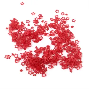 Red hollow star sequins for nail art and DIY epoxy resin crafts. Cute micro star charms detail shot.