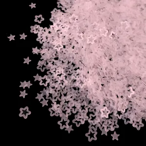 Detail shot of translucent matte hollow star sequins for resin nail art DIY crafting.