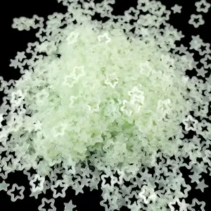 Close-up of translucent matte hollow star sequins for nail art and DIY resin crafts details