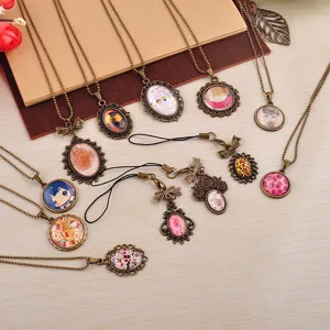 Vintage bronzo vetro cabochon pendente collana e cordino telefono DIY gioielli fatti