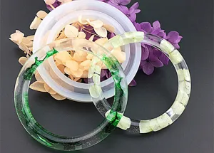 Closeup detail of DIY crystal resin silicone bracelet mold and dried flower bangle craft access.