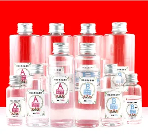 Epoxy resin crystal glue detail showing transparent AB bottles in various sizes and weights.