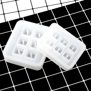 Silicone mold for resin casting with 6 grid holes, DIY handmade necklace pendant detail.