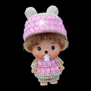 Rhinestone doll charm detailed shot, sparkly crystal pendant accessory for DIY decoration.
