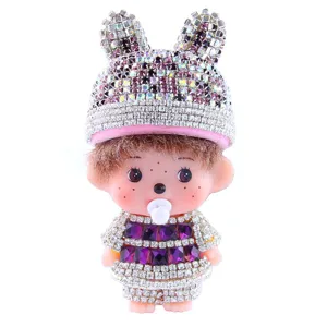Detailed view of rhinestone bunny ear doll ornament for DIY phone case and handmade accessories