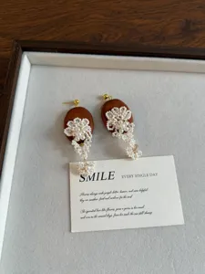 Retro wooden pearl beaded floral tassel earrings, ethnic style handmade stud earrings for women.