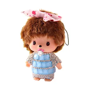 Cute plush doll keychain with sparkling rhinestone dress and bow, detailed accessory view.