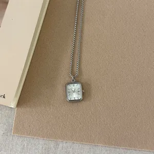 Chic metal clock pendant necklace with beaded chain, sweet-cool style fashion neck jewelry.