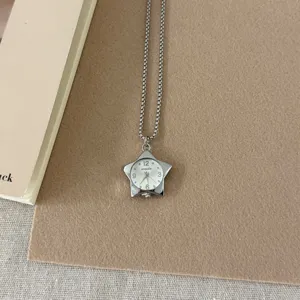 Detailed view of a stylish star-shaped clock pendant necklace with beaded chain for women.