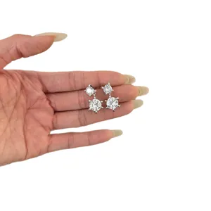 Elegant double round zirconia dangling earrings in silver tone, stylish fashion jewelry for women.