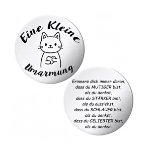 Stainless steel motivational token coin with cute cat design and engraved German quotes for gifts.