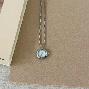 Silver pocket watch pendant necklace, vintage long sweater chain with delicate dial design.