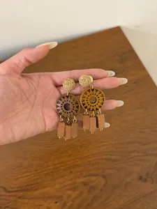 Vintage wooden dangle earrings with woven studs and hollow sun motif for women bohemian style.
