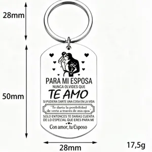 Stainless steel couple keychain with romantic Spanish engraving, perfect Valentine's gift.