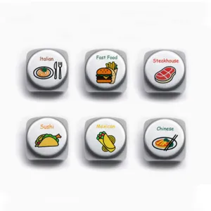 Dettaglio dado a tema alimentare in acciaio inox che mostra sei divertenti motivi culinari.