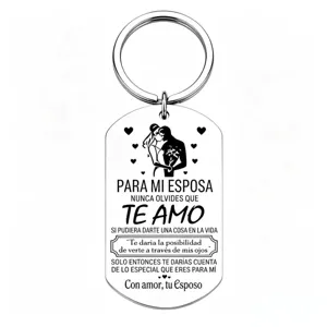 Stainless steel couple keychain with romantic engraved Spanish text, perfect anniversary gift.