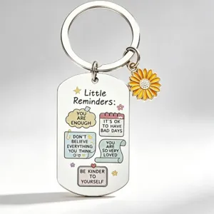 Inspirational quote stainless steel keychain with yellow sunflower charm for daily motivation.