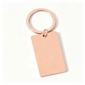 Porte-clés rectangulaire en acier inoxydable vierge or rose, idéal pour gravure laser.