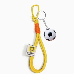 Football lanyard keychain with soccer ball pendant, great for sports souvenirs and backpacks.