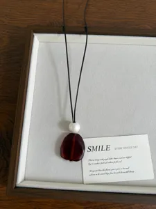 Collana con pendente a goccia bianco perla in stile cinese, catena maglione nera versatile.
