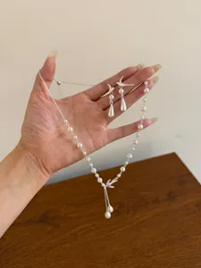 Exquisito conjunto de collar y pendientes de perlas de pájaro plateado para mujer, joya.