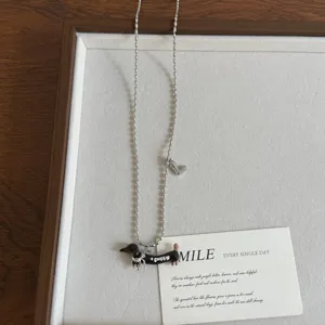 Retro oil-drop dachshund dog necklace for women, fashion chic long sweater chain jewelry.