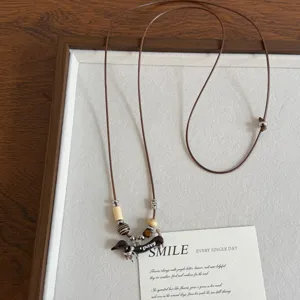 Vintage oil-drop dachshund necklace for women, stylish adjustable long sweater chain jewelry.