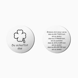 Stainless steel motivational decision coin featuring four leaf clover and inspiring German quotes.