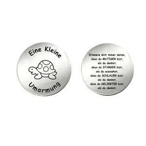 Stainless steel inspirational coin with cute turtle engraving and German motivational text.