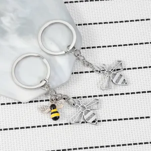 Stainless steel bee keychain detail view, cute animal backpack pendant accessory.