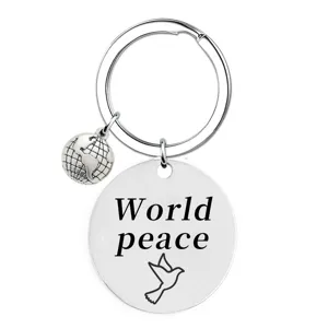 Stainless steel World Peace keychain with globe charm and peace dove pendant for daily use.