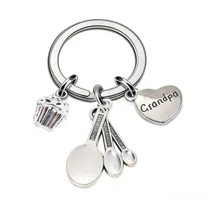 Zinc alloy keychain with heart cupcake and spoon charms, perfect gift for grandpa and parents.