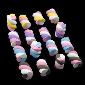 Detailed view of colorful twisted marshmallow clay charms for DIY phone case and accessories.