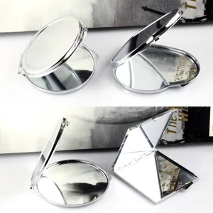 Minimalist silver stainless steel compact mirror, portable folding cosmetic pocket mirror.