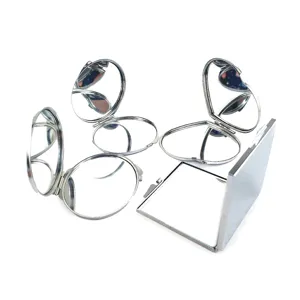Portable stainless steel compact folding mirror set in round, square, heart and oval shapes.