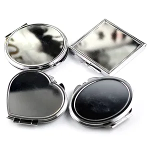 Compact silver folding makeup mirror set, portable pocket cosmetic mirror for daily use.