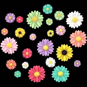 Resin daisy flatbacks close up, colorful small flower charms for DIY phone cases and hair bows.