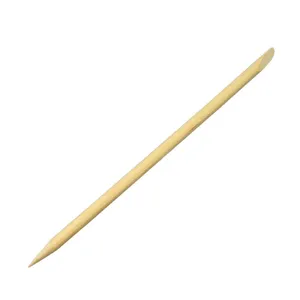 Wooden cuticle pusher detail view, natural wood manicure stick for nail care and art.