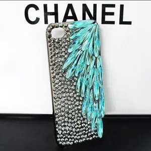 DIY rhinestone phone case with turquoise crystal teardrop wings, sparkling crystal accessories.