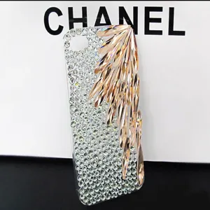 Dazzling rhinestone phone case detail featuring sparkling crystal teardrops and silver flatback stones.
