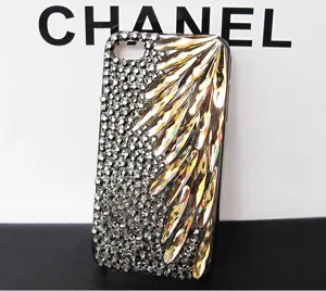 Crystal rhinestone phone case detail featuring sparkly teardrop gems and small rhinestones design.