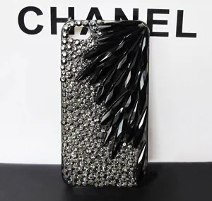 Rhinestone inlaid crystal phone case with sparkling black drop crystals and silver diamonds.