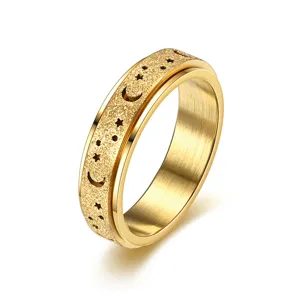 Anello antistress in acciaio inossidabile con design stella e luna vuote, finitura oro opaco.