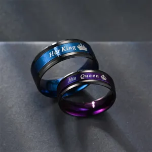 Detailed macro close up view of stainless steel couple rings with engraved texts.