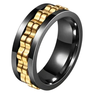 Anello uomo in acciaio titanio con ingranaggio rotante anti ansia nero oro vista principale