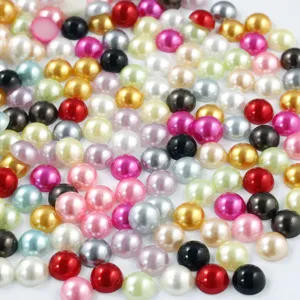 Detailed view of colorful ABS half-round pearl beads for DIY phone case craft accessories.
