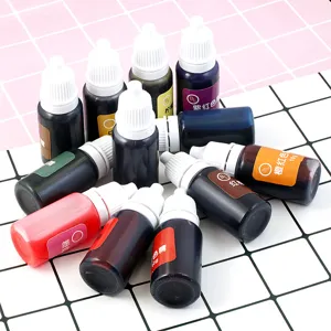 Detailed close-up of colorful resin pigment dropper bottles, vibrant epoxy color essence set.