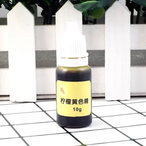 Lemon yellow epoxy resin pigment detail shot, 10g liquid dye bottle in dropper packaging.