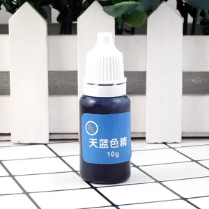 Close-up of 10g light blue epoxy resin color essence pigment bottle for DIY crafts.