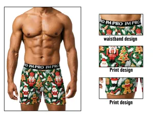 Detailansicht von Herren Weihnachtsshorts mit festlichem Print und elastischem Bund.